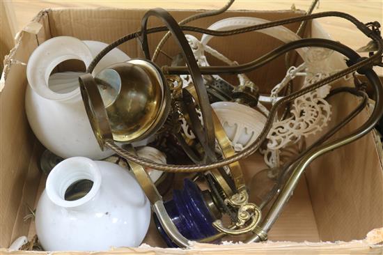 A collection of hanging oil lamps and light fittings